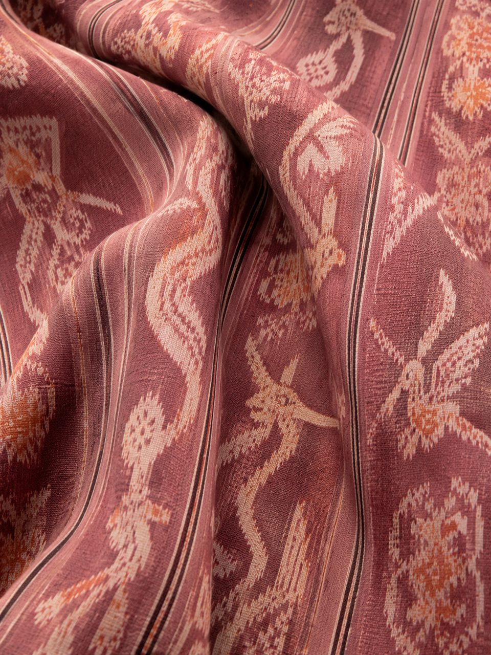 Ayu Topas backstrap weaving in natural rose-pink dye from East Nusa Tenggara