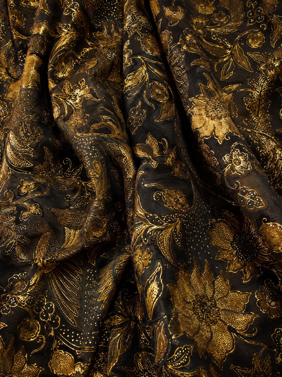 Pekalongan batik with a gilded prada finish from Central Java